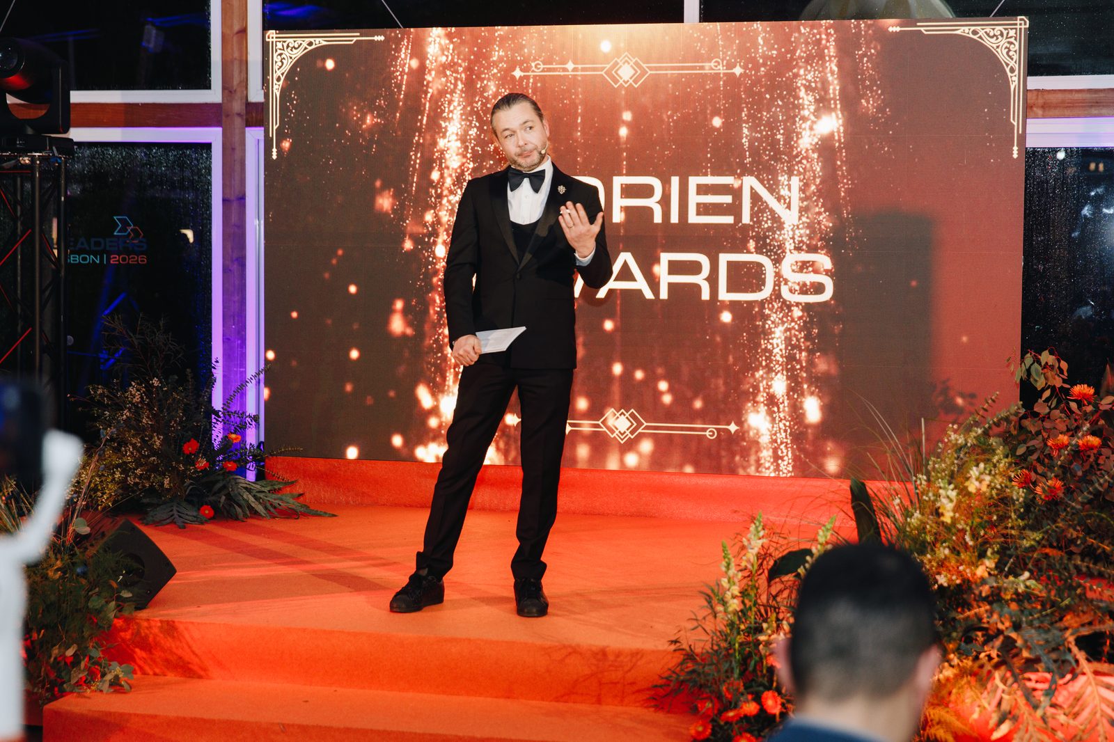 Branded conference stage with professional AV setup