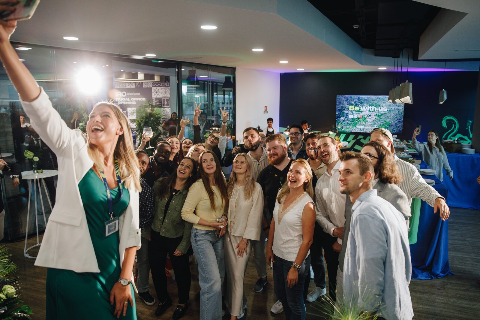 BrainRocket office opening ceremony with branded environmental design