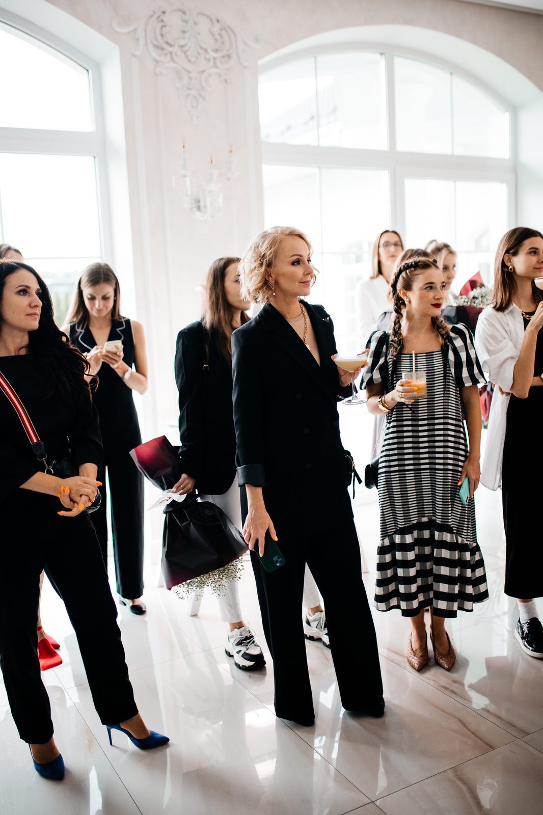 Guests networking at BrainRocket Portugal HQ launch