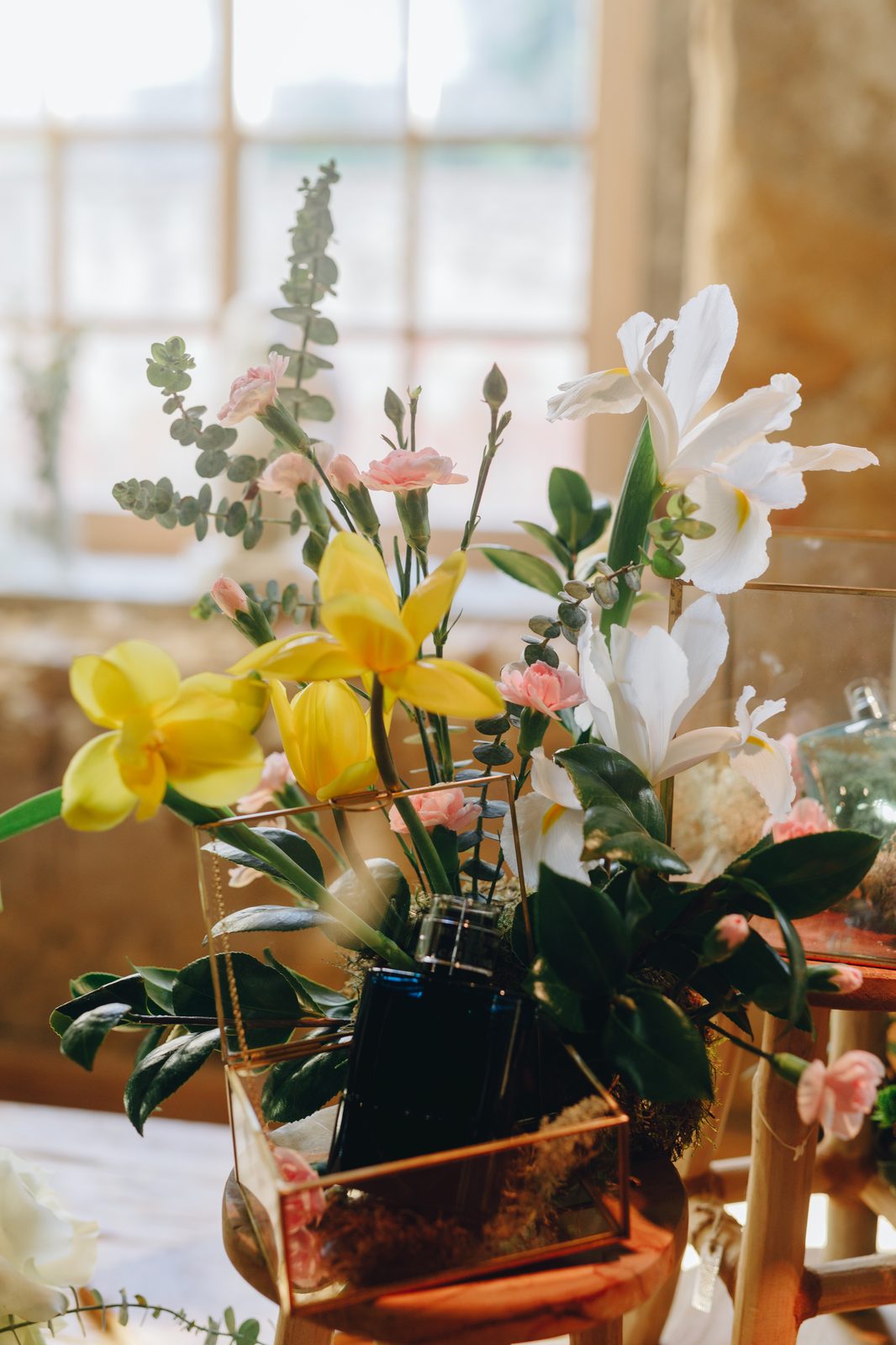 Detail shot of floral centrepiece at luxury gala dinner