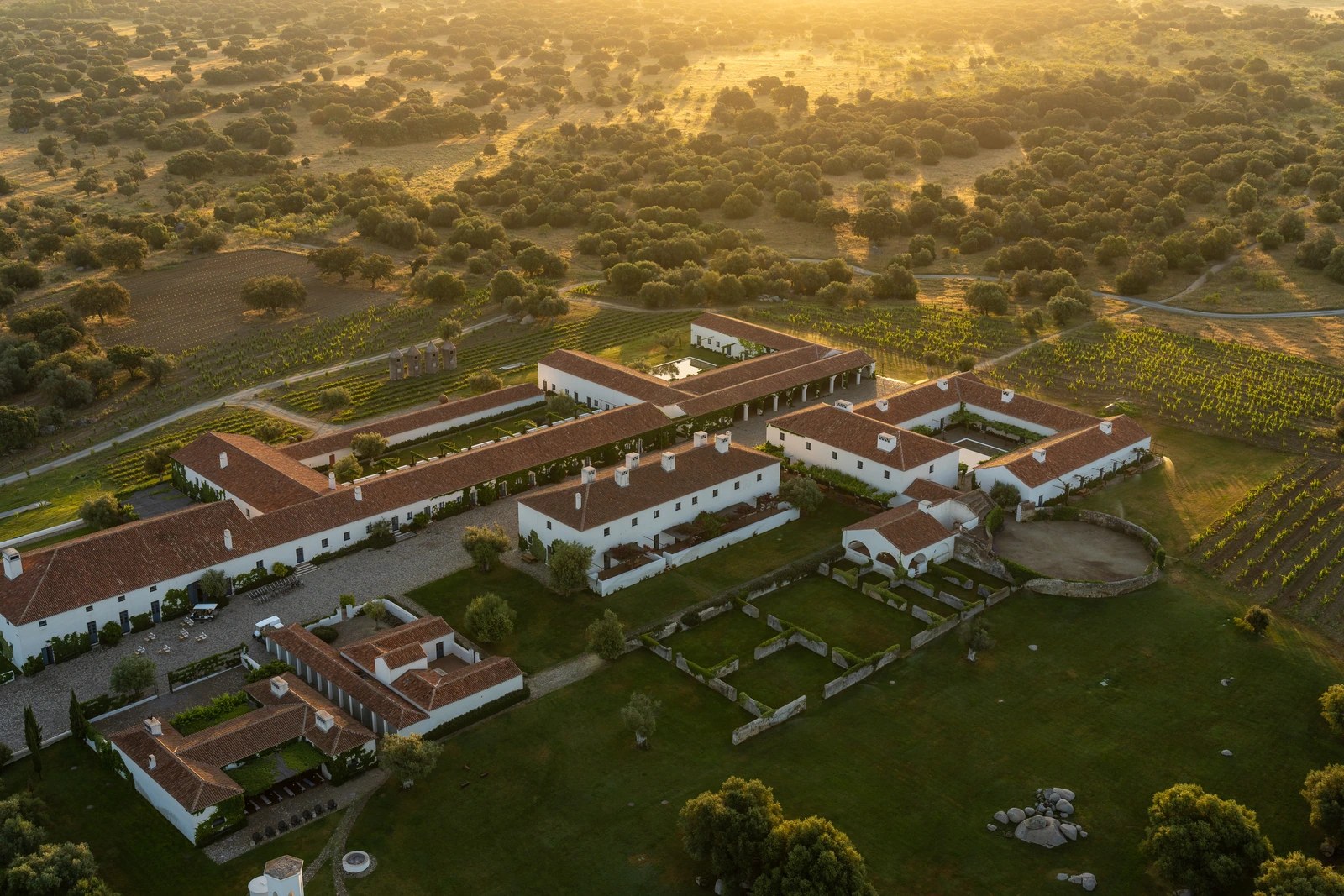 São Lourenço do Barrocal — whitewashed working-farm estate buildings on the open Alentejo plain near Monsaraz
