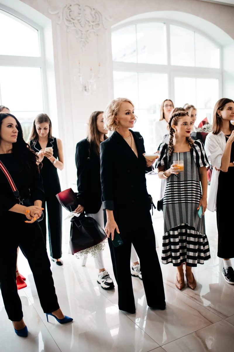 Guests networking at BrainRocket Portugal HQ launch