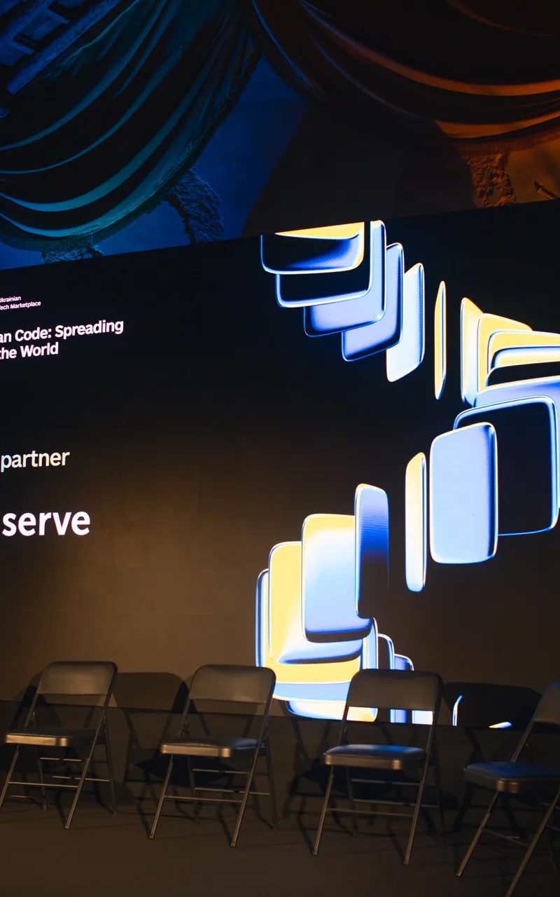 Conference stage setup with professional AV and lighting