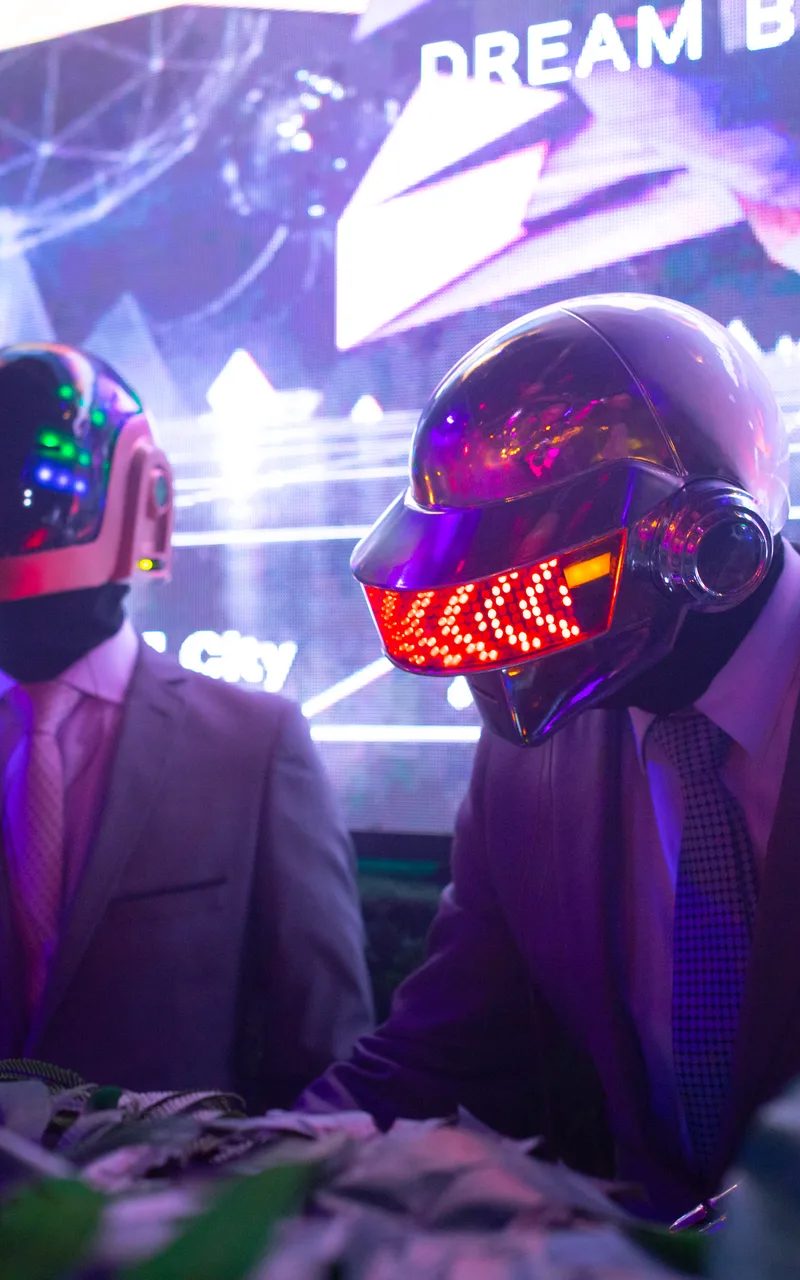 Entertainment performers with LED helmets at corporate event
