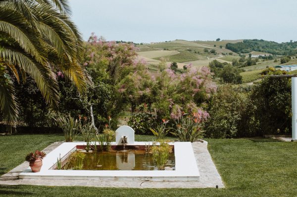 Casa Sacoto exterior · restored 19th-century manor with whitewashed walls and azulejo tile