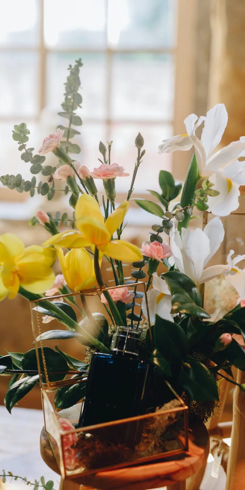 Detail shot of floral centrepiece at luxury gala dinner
