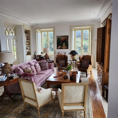 Palacio salon at Quinta da Bella Vista · arched windows, antiques and garden light